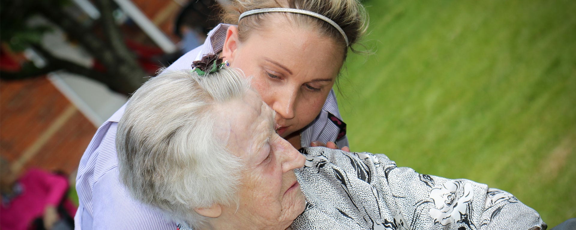 Laurel Care Home Care Assistant Checking on a resident