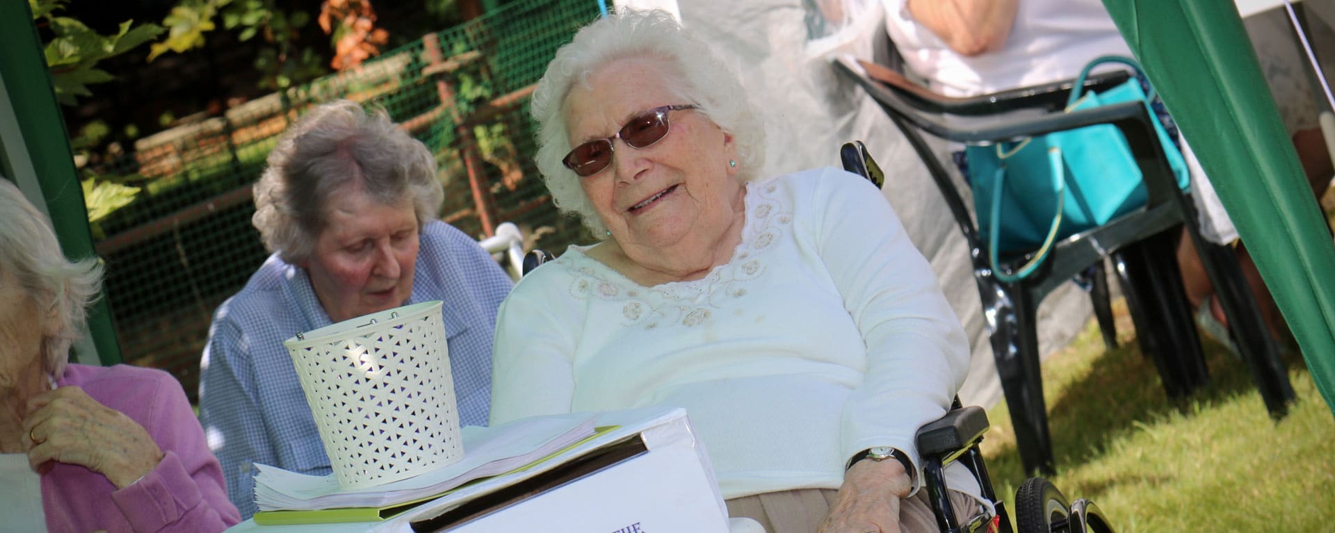 Laurel Care Home resident smiling in the garden