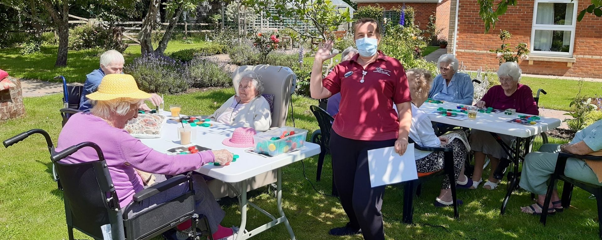 Residents palying bingo in the Laurel Care Home garden