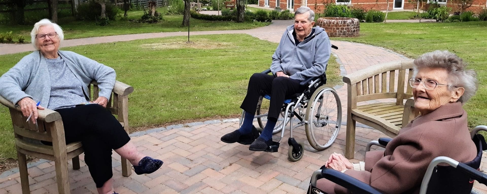 Three residents in their wheelchairs at Laurel Care Home